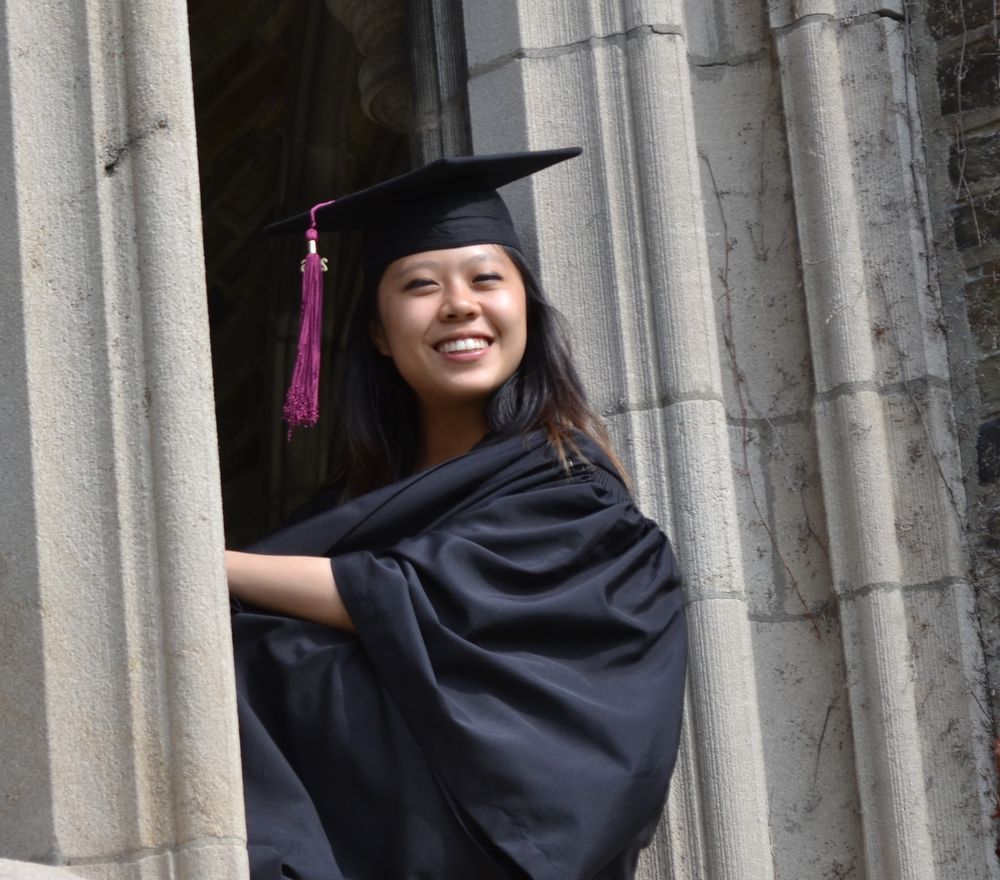 Graduating from Cornell University in cap and gown